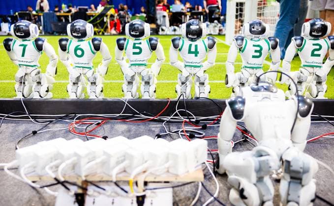 EINDHOVEN - Robot football team during a practice day in the run-up to the World Cup for Robots: RoboCup 2024. Universities and technology companies from all over the world show what their robots can do in various disciplines. ANP IRIS VAN DEN BROEK netherlands out - belgium out  Copyright: xx x503649947x originalFilename: 503649947.jpg