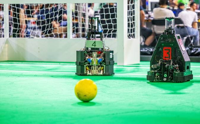 EINDHOVEN - Robot football during a practice day in the run-up to the World Cup for Robots: RoboCup 2024. Universities and technology companies from all over the world show what their robots can do in various disciplines. ANP IRIS VAN DEN BROEK netherlands out - belgium out  Copyright: xx x503650114x originalFilename: 503650114.jpg