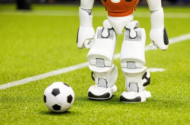 EINDHOVEN - Football robot during a practice day in the run-up to the World Cup for Robots: RoboCup 2024. Universities and technology companies from all over the world show what their robots can do in various disciplines. ANP IRIS VAN DEN BROEK netherlands out - belgium out  Copyright: xx x503650406x originalFilename: 503650406.jpg