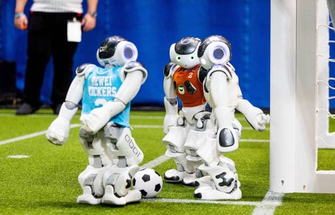 EINDHOVEN - Robot football during a practice day in the run-up to the World Cup for Robots: RoboCup 2024. Universities and technology companies from all over the world show what their robots can do in various disciplines. ANP IRIS VAN DEN BROEK netherlands out - belgium out  Copyright: xx x503650674x originalFilename: 503650674.jpg
