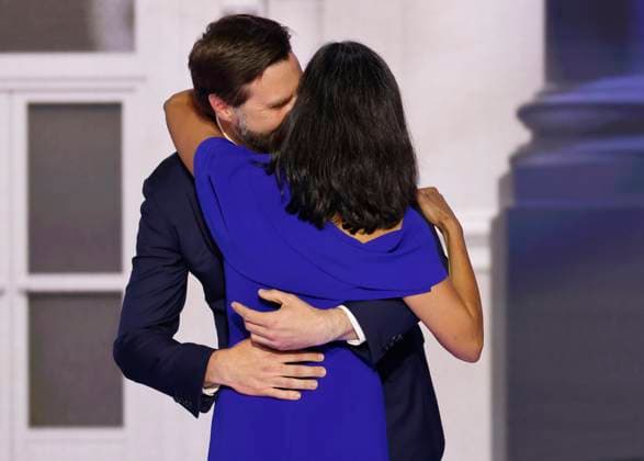 Republican Vice Presidential Nominee Sen. JD Vance, kisses his wife Usha after she introduced him at the 2024 Republican National Convention at Fiserv Forum in Milwaukee, Wisconsin on Wednesday, July 17, 2024. The third day of the convention is expected to focus on national security and foreign policy.  MIL20240717787 TANNENxMAURY
