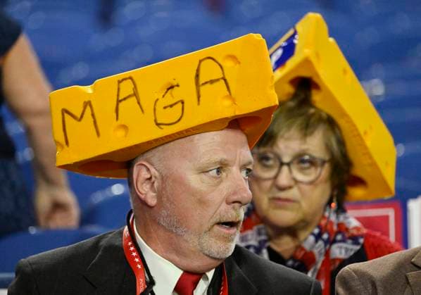 Wisconsin delegates wear cheese hats on the floor of the 2024 Republican National Convention at Fiserv Forum in Milwaukee, Wisconsin on Thursday, July 18, 2024. The theme of the final day of the convention is Make America Great Once Again, and will see former President Trump accept the GOP presidential nomination.  MIL20240718703 MATTxMARTON