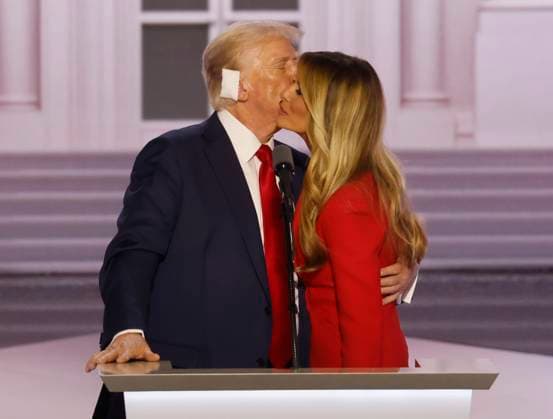 Republican Presidential nominee and former President Donald Trump kisses his wife Melania Trump after speaking at the 2024 Republican National Convention at Fiserv Forum in Milwaukee, Wisconsin on Thursday, July 18, 2024.  MIL20240718917 TANNENxMAURY