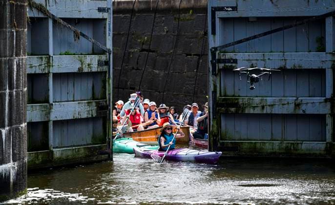 News Bilder des Tages July 20, 2024, Ottawa, On, CAN: A kayaker is the first to exit the lower locks at Hartwells Lockstation during Lock & Paddle 2024 on the Rideau Canal in Ottawa, on Saturday, July 20, 2024. A flotilla of canoes and kayaks descended and ascended the locks to celebrate Parks Day on the Rideau Canal, a UNESCO World Heritage site. Ottawa CAN  - ZUMAc35_ 20240720_zaf_c35_031 Copyright: xJustinxTangx