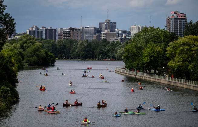 July 20, 2024, Ottawa, On, CAN: Paddlers make their way towards Dow s Lake after descending the locks at Hartwells Lockstation during Lock & Paddle 2024 on the Rideau Canal in Ottawa, on Saturday, July 20, 2024. A flotilla of canoes and kayaks descended and ascended the locks to celebrate Parks Day on the Rideau Canal, a UNESCO World Heritage site. Ottawa CAN  - ZUMAc35_ 20240720_zaf_c35_038 Copyright: xJustinxTangx