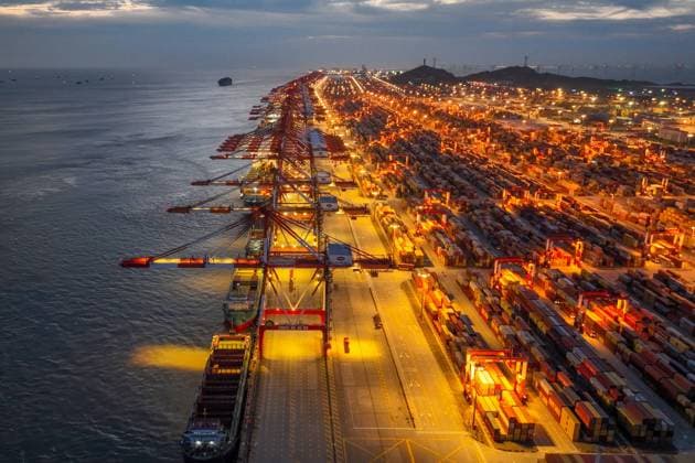 Yangshan Port in Shanghai SHANGHAI, CHINA - JULY 21, 2024 - Large container ships travel to and from Yangshan Port in Shanghai, China, July 21, 2024. Shanghai Shanghai China  Copyright: xCFOTOx i1721622591840