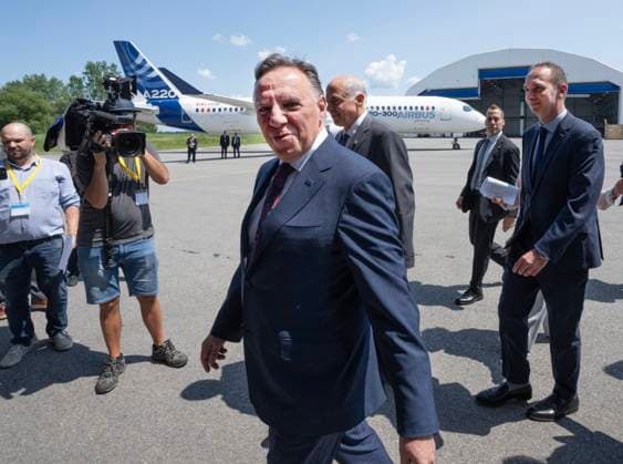 July 23, 2024, Montreal, Pq, Canada: Quebec Premier Francois Legault, Airbus Canada President Benoit Schultz, right, and Quebec Economy Minister Pierre FitzGibbons, centre, arrive at the Airbus A220 manufacturing facility in Mirabel, Que., Tuesday, July 23, 2024. The Quebec government is investing $410 million to increase production at the plant. Montreal Canada - ZUMAc35_ 20240723_zaf_c35_022 Copyright: xRyanxRemiorzx