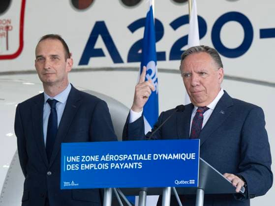 News Bilder des Tages July 23, 2024, Montreal, Pq, Canada: Quebec Premier Francois Legault, speaks as Airbus Canada President Benoit Schultz,left, looks on at the Airbus A220 manufacturing facility in Mirabel, Que., Tuesday, July 23, 2024. The Quebec government is investing $410 million to increase production at the plant. Montreal Canada - ZUMAc35_ 20240723_zaf_c35_023 Copyright: xRyanxRemiorzx