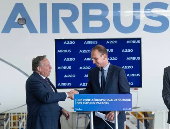 July 23, 2024, Montreal, Pq, Canada: Quebec Premier Francois Legault, shakes hands with Airbus Canada President Benoit Schultz, right, at the Airbus A220 manufacturing facility in Mirabel, Que., Tuesday, July 23, 2024. The Quebec government is investing $410 million to increase production at the plant. Montreal Canada - ZUMAc35_ 20240723_zaf_c35_024 Copyright: xRyanxRemiorzx