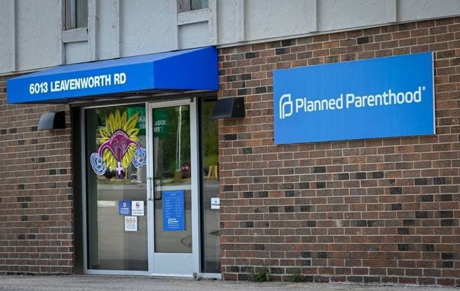 July 24, 2024: An Abortion is Health Care mural graces the front window at the new Planned Parenthood-Wyandotte Clinic in Kansas City, Kansas. The facility provides medical abortions, but not surgical abortions. - ZUMAm67_ 20240724_zaf_m67_010 Copyright: xTammyxLjungbladx