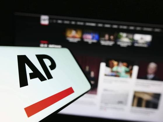 Stuttgart, Germany, 07-11-2023: Cellphone with logo of US news agency Associated Press (AP) on screen in front of website. Focus on center-left of phone display, Europe Copyright: imageBROKER TimonxSchneider ibliqx10714796.jpg
