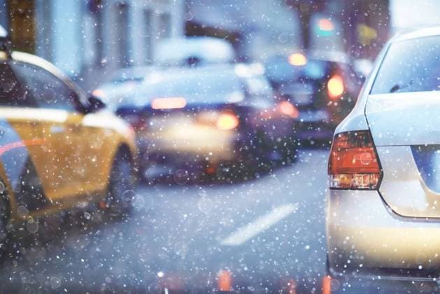 snow transport road city landscape in a night city in winter, cars on the road in traffic jam in cold weather, snow ,model released, Symbolfoto