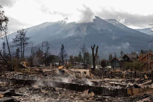 July 26, 2024, Jasper, Ab, CANADA: A devastated residential block in Jasper, Alta., is shown during a tour on Friday, July 26, 2024. Wildfires encroaching into the townsite of Jasper forced an evacuation of the national park and have destroyed over 300 of the town s approximately 1100 structures, mainly impacting residential areas. Jasper CANADA  - ZUMAc35_ 20240726_zaf_c35_130 Copyright: xAmberxBrackenx