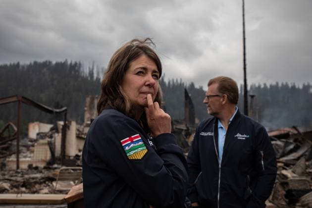 July 26, 2024, Jasper, Ab, CANADA: Premier Danielle Smith tours Jasper, Alta., on Friday, July 26, 2024. Wildfires encroaching into the townsite of Jasper forced an evacuation of the national park and have destroyed over 300 of the town s approximately 1100 structures, mainly impacting residential areas. Jasper CANADA  - ZUMAc35_ 20240726_zaf_c35_143 Copyright: xAmberxBrackenx