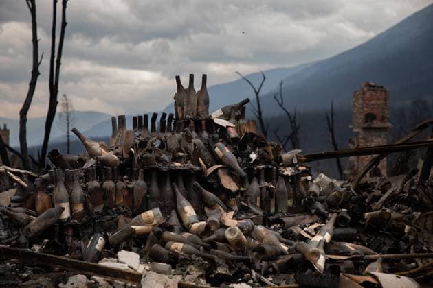 July 26, 2024, Jasper, Ab, CANADA: The remains of someone s wine collection in Jasper, Alta., on Friday July 26, 2024. Wildfires encroaching into the townsite of Jasper forced an evacuation of the national park and have destroyed over 300 of the town s approximately 1100 structures, mainly impacting residential areas. Jasper CANADA  - ZUMAc35_ 20240726_zaf_c35_166 Copyright: xAmberxBrackenx