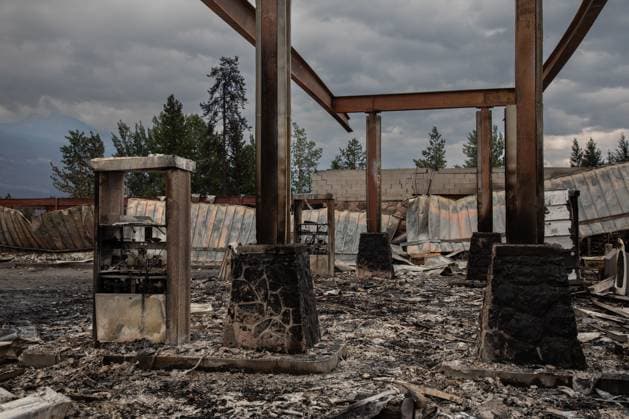 July 26, 2024, Jasper, Ab, CANADA: The remains of a Petro Canada gas station in Jasper, Alta., on Friday July 26, 2024. Wildfires encroaching into the townsite of Jasper forced an evacuation of the national park and have destroyed over 300 of the town s approximately 1100 structures, mainly impacting residential areas. Jasper CANADA  - ZUMAc35_ 20240726_zaf_c35_196 Copyright: xAmberxBrackenx
