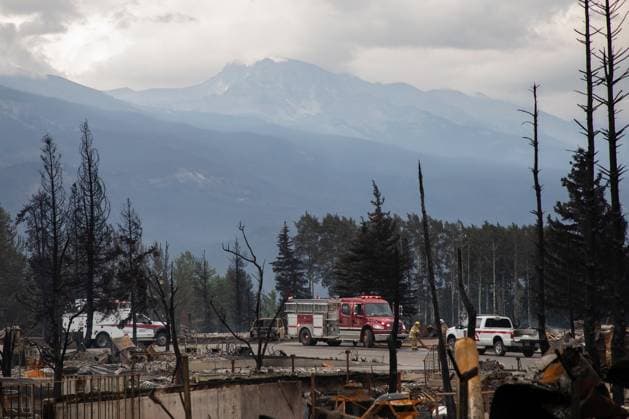 July 26, 2024, Jasper, Ab, CANADA: Fire crews work in a devastated neighbourhood in Jasper, Alta., on Friday, July 26, 2024. Wildfires encroaching into the townsite of Jasper forced an evacuation of the national park and have destroyed over 300 of the town s approximately 1100 structures, mainly impacting residential areas. Jasper CANADA  - ZUMAc35_ 20240726_zaf_c35_233 Copyright: xAmberxBrackenx