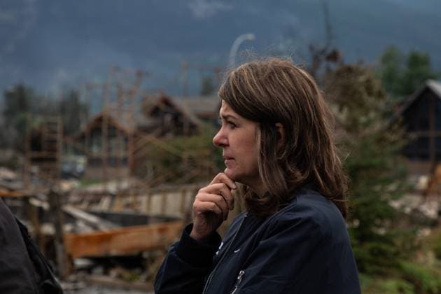 July 26, 2024, Jasper, Ab, CANADA: Premier Danielle Smith tours Jasper, Alta., on Friday, July 26, 2024. Wildfires encroaching into the townsite of Jasper forced an evacuation of the national park and have destroyed over 300 of the town s approximately 1100 structures, mainly impacting residential areas. Jasper CANADA  - ZUMAc35_ 20240726_zaf_c35_234 Copyright: xAmberxBrackenx
