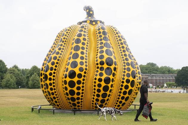 Yayoi Kusama s Pumpkin Unveiled at The Round Pond, Kensington Gardens, London Visitors view Japanese Artist Yayoi Kusama s Pumpkin at The Round Pond, Kensington Gardens, London, England, UK on Tuesday 9 July, 2024 which is on display from 9 July 3 November 2024.,  Copyright: xJustinxNgx xAvalonx 0888427803