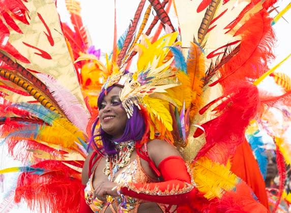 (240804) -- TORONTO, Aug. 4, 2024 -- A dressed-up reveler takes part in the Grand Parade of the 2024 Toronto Caribbean Carnival in Toronto, Canada, Aug. 3, 2024. The annual event was held here on Saturday to showcase Caribbean culture. (Photo by Zou Zheng Xinhua) CANADA-TORONTO-CARIBBEAN CARNIVAL-GRAND PARADE LinxWei 
