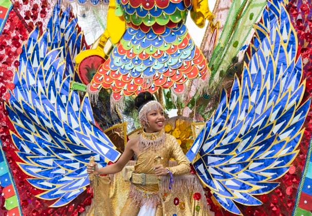 (240804) -- TORONTO, Aug. 4, 2024 -- A dressed-up reveler takes part in the Grand Parade of the 2024 Toronto Caribbean Carnival in Toronto, Canada, Aug. 3, 2024. The annual event was held here on Saturday to showcase Caribbean culture. (Photo by Zou Zheng Xinhua) CANADA-TORONTO-CARIBBEAN CARNIVAL-GRAND PARADE LinxWei 