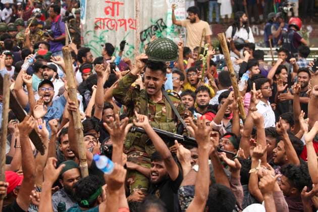 August 5, 2024, Dhaka, Dhaka, Bangladesh: Anti-government protestors celebrate in Dhaka on August 5, 2024. Protests in Bangladesh that began as student-led demonstrations against government hiring rules in July culminated on August 5, in the prime minister fleeing and the military announcing it would form an interim government. Dhaka Bangladesh - ZUMAj163 20240805_zip_j163_008 Copyright: xAbuxSufianxJewelx
