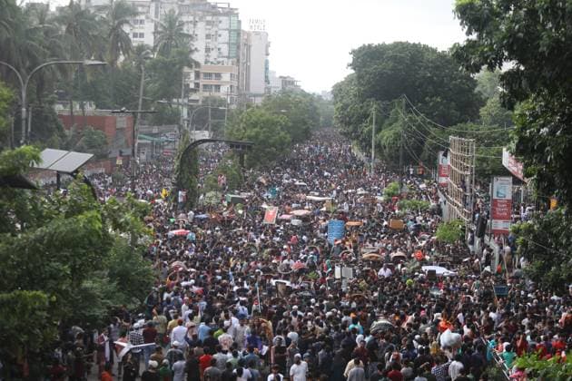 August 5, 2024, Dhaka, Wari, Bangladesh: Anti-government protestors celebrate in Shahbag near Dhaka university area in Dhaka on August 5, 2024. Protests in Bangladesh that began as student-led demonstrations against government hiring rules in July culminated on August 5, in the prime minister fleeing and the military announcing it would form an interim government.People gather to celebrate the fall of Bangladesh Prime Minister Sheikh Hasina after an intense clash between police, pro-government forces, and anti-Quota protesters in Dhaka, Bangladesh. Dhaka Bangladesh - ZUMAr336 20240805_zip_r336_030 Copyright: xHabiburxRahmanx