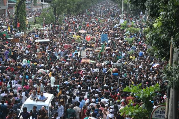 August 5, 2024, Dhaka, Wari, Bangladesh: Anti-government protestors celebrate in Shahbag near Dhaka university area in Dhaka on August 5, 2024. Protests in Bangladesh that began as student-led demonstrations against government hiring rules in July culminated on August 5, in the prime minister fleeing and the military announcing it would form an interim government.People gather to celebrate the fall of Bangladesh Prime Minister Sheikh Hasina after an intense clash between police, pro-government forces, and anti-Quota protesters in Dhaka, Bangladesh. Dhaka Bangladesh - ZUMAr336 20240805_zip_r336_072 Copyright: xHabiburxRahmanx