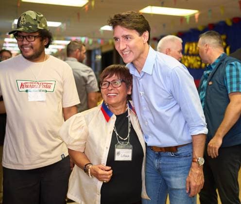August 5, 2024, Winnipeg, Mb, CANADA: Prime Minister Justin Trudeau greets members of the audience at the Folklorama Filipino Pavilion in Winnipeg, Monday, Aug. 5, 2024, at R.B. Russell Vocational School. Winnipeg CANADA  - ZUMAc35_ 20240805_zaf_c35_086 Copyright: xDavidxLipnowskix