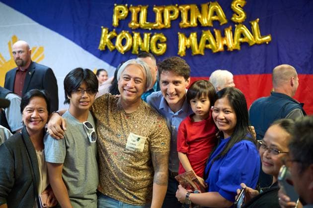 August 5, 2024, Winnipeg, Mb, CANADA: Prime Minister Justin Trudeau greets members of the audience at the Folklorama Filipino Pavilion in Winnipeg, Monday, Aug. 5, 2024, at R.B. Russell Vocational School. Winnipeg CANADA  - ZUMAc35_ 20240805_zaf_c35_088 Copyright: xDavidxLipnowskix