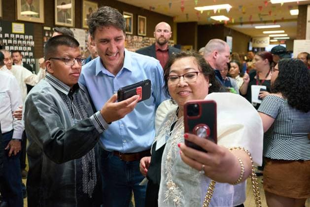 August 5, 2024, Winnipeg, Mb, CANADA: Prime Minister Justin Trudeau greets members of the audience at the Folklorama Filipino Pavilion in Winnipeg, Monday, Aug. 5, 2024, at R.B. Russell Vocational School. Winnipeg CANADA  - ZUMAc35_ 20240805_zaf_c35_096 Copyright: xDavidxLipnowskix