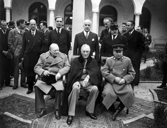 Archivbilder der Woche KW32 Yalta Conference 597273 04.02.1945 The Yalta (Crimea) Conference of Allied leaders (February 4-11, 1945). First row, sitting: British Prime Minister Winston Churchill, U.S. President Franklin Delano Roosevelt, and U.S.S.R. Marshal Josef Stalin before a meeting. Standing: British Foreign Minister Anthony Eden, U.S. Secretary of State Edward Stettinius, and People s Commissar for U.S.S.R. Foreign Affairs Vyacheslav Molotov. Reproduction of a photograph. RIA Novosti Sputnik Yalta Republic of Crimea Russia  Copyright: xRIAxNovostix