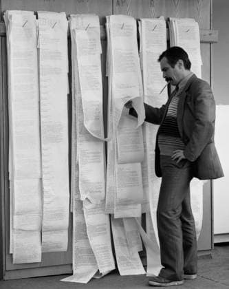 Moscow, USSR. Chief Editor of the Main Foreign Information Editorial Office Vladimir Alexandrov reads messages received from the Telegraph Agency of the Soviet Union s own correspondents and from foreign news agencies in the main TASS building on Tverskoy Boulevard. Boris Kavashkin, Valery Khristoforov TASS  18348625