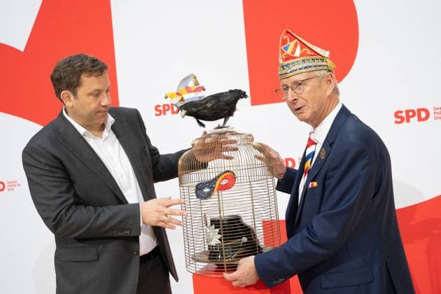 SPD party chairman Lars Klingbeil during a press and photo session in the Willy Brandt House together with Wolfgang Hyrenbach with jesters cap, chairman of the Aachen Carnival Association AKV Press event with Lars Klingbeil on the upcoming award of the carnival order Orden wider den tierischen Ernst to the SPD party chairman, Berlin Berlin Germany Willy