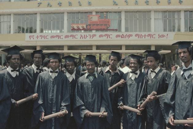 July 1-19, 1983. Bahir Dar, Ethiopia. Graduates of the Bahir Dar Polytechnic Institute pose for a photo after the graduation ceremony. The institute was built with the support of the USSR under the Treaty of Friendship and Cooperation between the Union of Soviet Socialist Republics and Socialist Ethiopia of November 20, 1978. The exact date of the photograph is unknown. Yuri Lizunov TASS  17521864