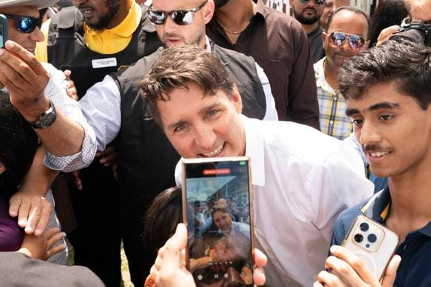 August 10, 2024, Brampton, On, Canada: Prime Minister Justin Trudeau takes selfies with a crowd of supporters at a cricket tournament in Brampton, Ont., Saturday, August 10, 2024. Brampton Canada  - ZUMAc35_ 20240810_zaf_c35_153 Copyright: xArlynxMcadoreyx