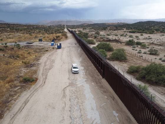US-Mexico Border Wall in Jacumba Hot Springs - 11 Aug 2024 (Editor s note: Image taken by drone.) A vehicle of border patrol is driven along the border wall at the U.S. side. The area in Jacumba Hot Springs in California is one of the popular places that migrants cross the border from Mexico to the United States. Even though there are a lot of officers patrol on both sides, hundreds of migrants still enter the United States everyday. Jacumba Hot Springs United States Copyright: xMichaelxHoxWaixLeex xSOPAxImagesx MichaelHo4377
