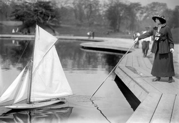 Woman with model yacht, Conservatory Lake, Central Park, New York City, New York, USA, Bain News Service, 1915  Copyright: xCircaxImagesx ghi-circa02856