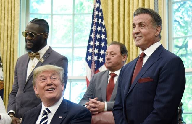President Trump grants posthumous pardon to former heavyweight champion Jack Johnson Actor Sylvester Stallone (R) and United States President Donald J. Trump (L) share a laugh during a signing ceremony to grant posthumous pardon to former heavyweight champion Jack Johnson in the Oval Office of the White House on May 24, 2018 in Washington, DC. Photo Credit: Olivier Douliery CNP AdMedia Washington District of Columbia United States of America EDITORIAL USE ONLY  Copyright: xx OlivierxDoulieryx admphotostwo493965