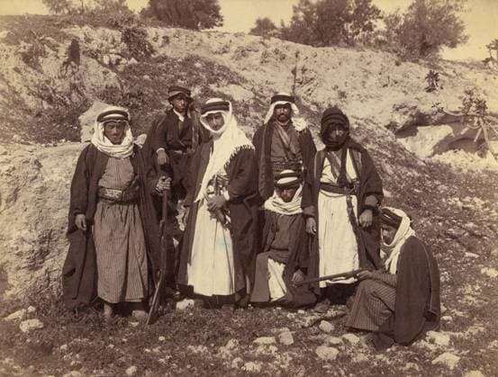 Bedouin men of Arakat tribe, portrait with swords and rifles, American Colony Photo Department, early 1900 s  Copyright: xCircaxImagesx ghi-circa03887