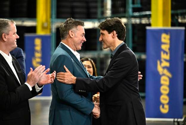 August 12, 2024, Napanee, On, CAN: Prime Minister Justin Trudeau shakes hands with Mark Stewart, Chief Executive Officer and President of Goodyear, during an announcement at the Goodyear plant in Napanee, Ont., on Monday, Aug. 12, 2024. Napanee CAN - ZUMAc35_ 20240812_zaf_c35_002 Copyright: xJustinxTangx