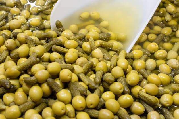 Green olives stuffed with pickle background. Spanish appetizer Green olives stuffed with pickle background. Spanish appetizer Copyright: xZoonar.com AndresxVictorerox 21741887
