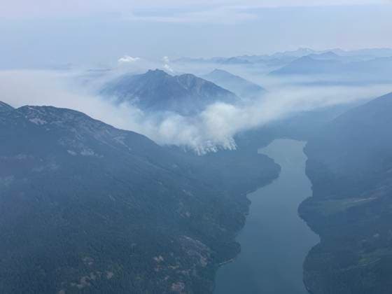 (240813) -- BRITISH COLUMBIA (CANADA), Aug. 13, 2024 -- Aerial photo provided by shows smoke rising from wildfires near Birkenhead Lake, British Columbia, Canada, on Aug. 11, 2024. There are 428 active wildfires across British Columbia in Canada, according to . ( Handout via Xinhua) CANADA-BRITISH COLUMBIA-WILDFIRES BCxWildfirexService 