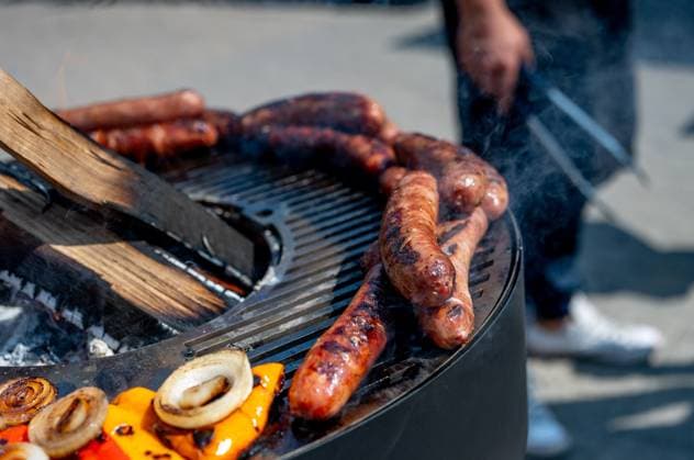 August 14, 2024, Toronto, On, Canada: Chef Matt Basile cooks meat on an Alchemy grill on media preview day at the Canadian National Exhibition in Toronto on Wednesday, August 14, 2024. Toronto Canada  - ZUMAc35_ 20240814_zaf_c35_031 Copyright: xLauraxProctorx