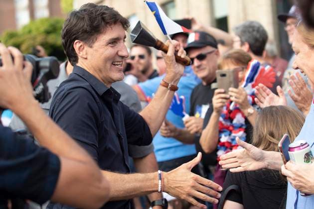 August 15, 2024, Yarmouth, Ns, Canada: Prime Minister Justin Trudeau greets people in the crowd during the Tintamarre Parade in Yarmouth, N.S., on Thursday, August 15, 2024. Yarmouth Canada  - ZUMAc35_ 20240815_zaf_c35_060 Copyright: xRonxWardx