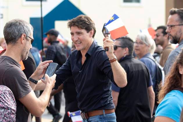 August 15, 2024, Yarmouth, Ns, Canada: Prime Minister Justin Trudeau greets people in the crowd during the Tintamarre Parade in Yarmouth, N.S., on Thursday, August 15, 2024. Yarmouth Canada  - ZUMAc35_ 20240815_zaf_c35_062 Copyright: xRonxWardx