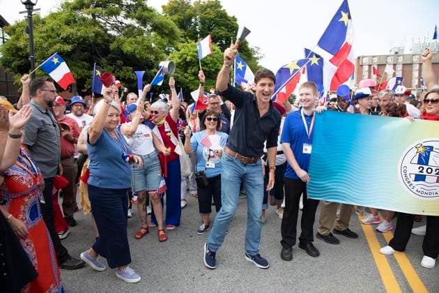 August 15, 2024, Yarmouth, Ns, Canada: Prime Minister Justin Trudeau, centre, and Governor General Mary Simon, left, walk in the Tintamarre Parade in Yarmouth Nova Scotia, on Thursday, August 15, 2024. Yarmouth Canada - ZUMAc35_ 20240815_zaf_c35_072 Copyright: xRonxWardx