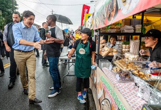 August 17, 2024, Toronto, On, Canada: Prime Minister Justin Trudeau greets people in the rain at the Taste of Manila festival in Toronto on Saturday, August 17, 2024. Toronto Canada  - ZUMAc35_ 20240817_zaf_c35_040 Copyright: xLauraxProctorx
