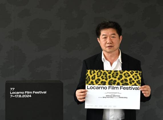 Locarno,Switzerland Awards Locarno Film Festival 2024 photocall Locarno,Switzerland Locarno Film Festival 2024 Award Ceremony photocall Locarno Film Festival 2024 Quing chun (Ku) film by WANG Bing director Award In the photo:WANG Bing director Award Locarno Switzerland  Copyright: xIPA ABACAx