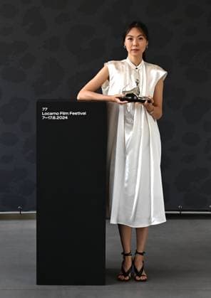 Locarno: Locarno,Switzerland Locarno Film Festival 2024 Award Ceremony photocall Locarno Film Festival 2024 SUYOOCHEON film by Hong Sangsoo director Pardo Argento Award and Kim Minhee actress best performance In the photo:Kim Minhee actress best performance Pardo Argento Award Locarno  - ZUMAp169 20240817_zea_p169_150 Copyright: xNickxZonnax